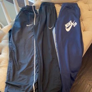 3 Pair of Boys Nike Pants, size Medium/Large. Like new condition.